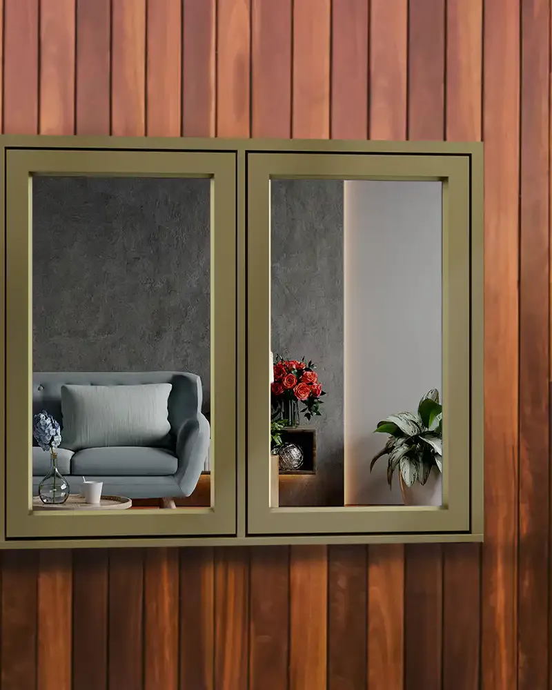 Olive aluminium clad timber windows in cedar cladding, made by Spittlywood